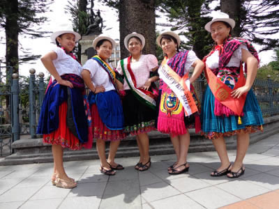 Young women posing in Parque Calderon – the large city park in the middle of downtown Cuenca.   These young women are dressed for a celebration; they usually wear western-style clothes during the normal work days.  